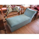 An upholstered daybed ottoman, the hinged seat with drop arm, 166cm long