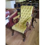 A Victorian mahogany armchair, the scroll button back and seat on outsplayed legs with hoof feet