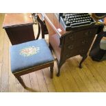 A concave front bedside cabinet, with drop flaps and three drawers on cabriole legs, and a stool (