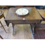 A reproduction mahogany sofa table, the drop leaves over two frieze drawers on reeded outsplayed