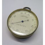 A brass cased pocket barometer by A&N CSL