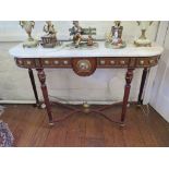 A French style porcelain mounted marble top console table, with reeded tapering legs joined by a