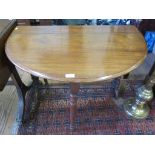 A Victorian mahogany top Sutherland table, the oval top with moulded edge, on turned legs and pole