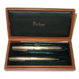 A 9 carat gold Parker 51 'Presidential' fountain pen and pencil set, in original box