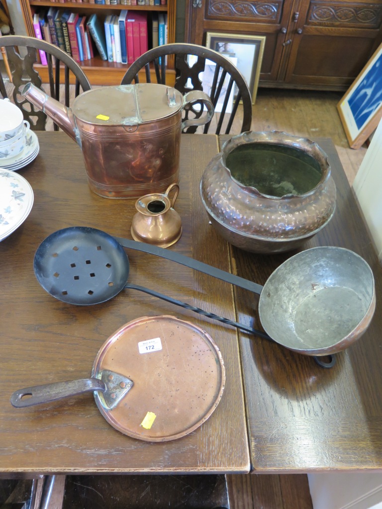 A copper watering can, jardiniere, chestnut burner and other copperwares