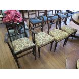 A set of three Victorian mahogany balloon back dining chairs with reeded tapering legs, and an Ercol