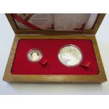 A Winston Churchill Krugerand commemorative set of 1/4 oz gold Krugerrand and a silver medallion