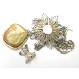 A cameo brooch set in a 9ct gold frame and a silver brooch etc