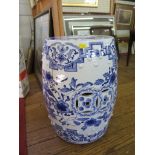 A Chinese blue and white garden seat, of barrel form with floral and dragon decoration, 46cm high