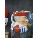 A late 19th century character jug depicting Mr Punch, registered no. 139844, 12cm high