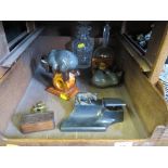 A bronze inkwell surmounted by a figure of a bear, 16cms wide, a pair of USSR ceramic figures of