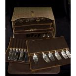 A canteen of sterling silver cutlery for eight place settings by Gorham of the USA, Camellia pattern