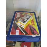 A Matchbox carry case of die-cast toys including fighter jets and rescue vehicles and a Llado Roland