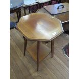 An Edwardian mahogany and satinwood crossbanded octagonal window table, with square legs, joined