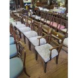 A set of six William IV mahogany dining chairs, including two carvers, with horizontal rails above