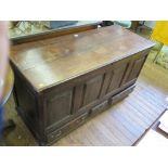 A 19th Century mule chest, the hinged top over a four panel front and three drawers, 142cm wide x