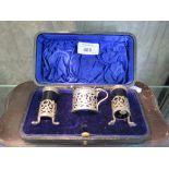 A Victorian three piece silver condiment set, Birminahm 1900 in original presentation case