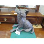 A resin bronze effect model of a seated great dane dog, 22cm high