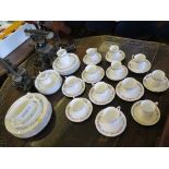 A Royal Doulton Pastoralle pattern dinner service for eight place settings, and a Paragon Belinda