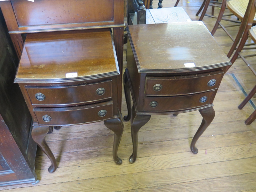 A pair of mahogany bow front bedside cabinets, each with two drawers on cabriole legs, 37cm wide (2)