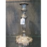 A single silver Georgian candlestick of Rococo style