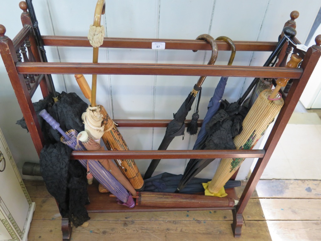 A collection of Victorian and later parasols and umbrellas including some Chinese