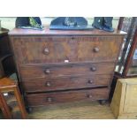 An early 19th Century mahogany chest of drawers, the hinged top with dummy secretaire front over
