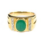 An emerald and diamond gents ring set in 9 carat gold