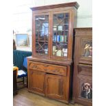 A Victorian walnut secretaire bookcase, with astragal glazed doors over a panelled and fitted