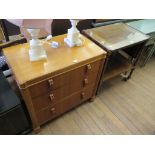 An oak chest of three drawers, 1940's, 76cm wide and a mahogany two tier tea trolley (2)