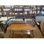 A miniature Windsor style two seater chair, 42cm x 38cm