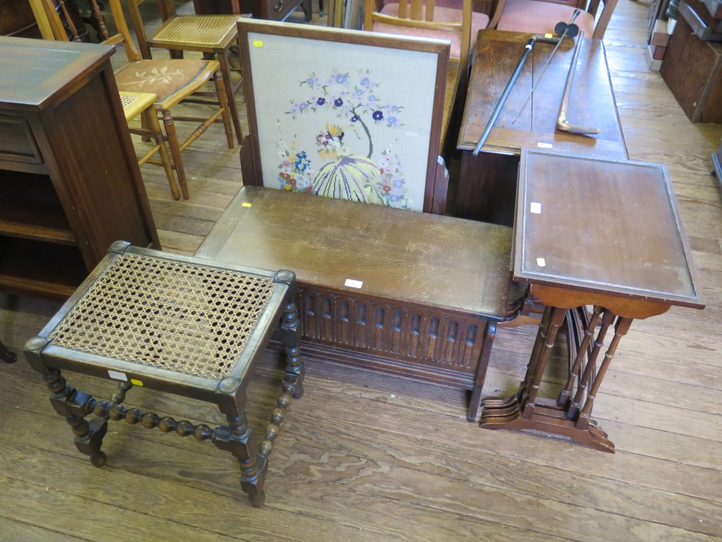 An oak coffer with stop-fluted front 76cm wide, an oak framed fire screen and a nest of three tables