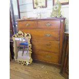 An Edwardian walnut chest of drawers, with two short and three long drawers on a plinth base, 103 cm