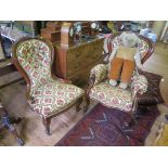 A pair of mid Victorian mahogany ladies and gents salon chairs, the spoon shape button upholstered