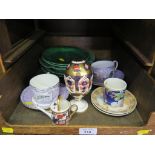 A Royal Crown Derby egg and cup, a miniature watering can, various cabbage plates and other china