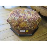 A Victorian chequerbanded octagonal footstool with upholstered hinged top enclosing a brown glaze