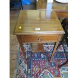 An Edwardian mahogany satinwood crossbanded side table, with patera inlaid top, frieze drawer and