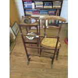 A George III mahogany washstand, the open top on square supports joined by a drawer, 33cm wide, a