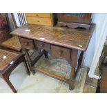 An 18th century oak side table, with three frieze drawers and shaped apron on turned and block