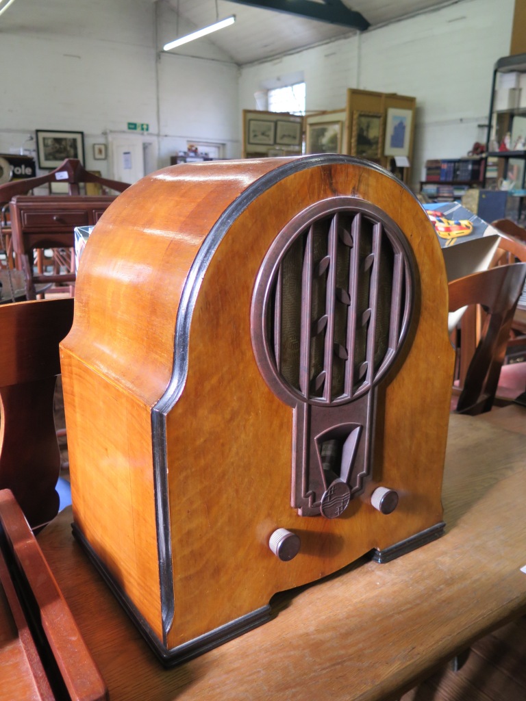 A 1930's walnut cased Philco radio, 48cm high