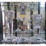 Three graduated Shannon crystal candlesticks of tapering square form, labelled, 30cm, 25cm and