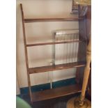 A mahogany wall shelf with four graduated shelves, 61cm wide, 106cm high