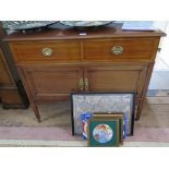 An Edwardian mahogany and chevron banded dressing table, with two frieze drawers over cupboard doors