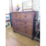 An early 19th Century mahogany chest of drawers, the hinged top with dummy secretaire front over