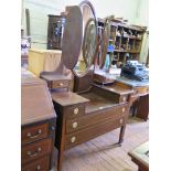 An Edwardian mahogany and chevron banded dressing table, with oval triptych mirror, and an