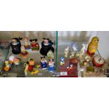 A pair of Tom and Jerry figures, various Mickey Mouse figures and other ornaments