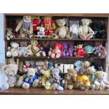 A collection of teddy bears, including Merrythought, Giorgio Beverly Hills and others