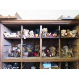 A collection of small teddy bears, including Merrythought, TY and others