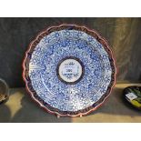 A Worcester Royal Lily pattern side plate with pie-crust edge, crescent mark, 23cm diameter