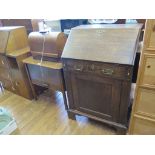 An oak sewing box with hinged lid and frieze drawer, a Singer sewing machine, and an oak bureau (3)